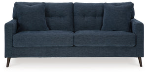 Feed your mid-century modern nostalgiaâ€”with a contemporary twist. A vibrant trend-right hue and comfy feel make this sofa perfect for lounging solo or with friends and family. Its linear profile adds plenty of fresh style, and the tapered accent legs ar