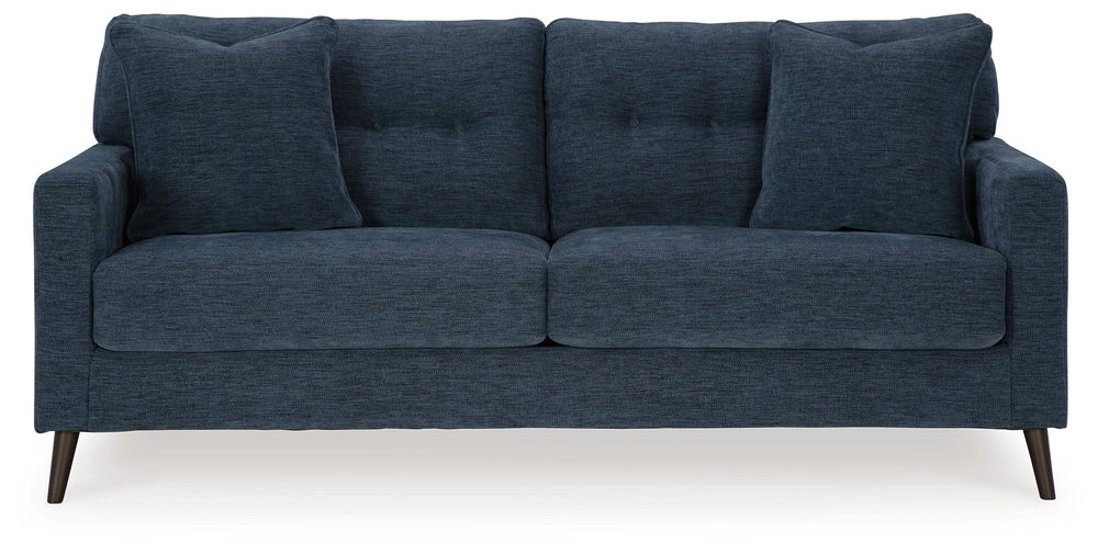 Feed your mid-century modern nostalgiaâ€”with a contemporary twist. A vibrant trend-right hue and comfy feel make this living room set perfect for lounging solo or with friends and family. Its linear profile adds plenty of fresh style, and the tapered acc