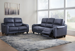 This power reclining sofa with matching loveseat set puts a sleek twist on laid-back living. It satisfies your desire for comfort without being bulky in design, thanks to subtly incorporated one-touch reclining and adjustable headrests. With chic exposed 