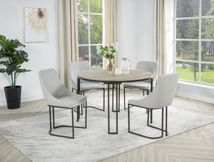 Bring style and comfort to your dining space with this chic and modern set. The round tabletop features a beautiful woodgrain finish, adding warmth and character to any room. Supported by a sturdy metal frame with a sleek, open design, it blends durabilit