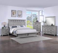 This bedroom suite offers a refreshing take on rustic charm, featuring a soft greige finish that highlights the natural wood grain. The sturdy bed stands as the centerpiece with its robust headboard and inviting design, while the accompanying pieces â€” a