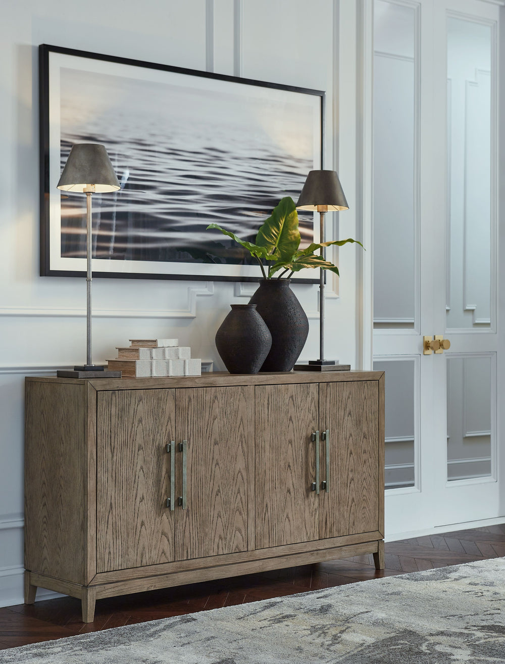 You want your dining room to reflect your refined sensibilities while remaining forward-thinking in design. The simple silhouette of this dining server opens the door to a dining room with the curated look and subtle flair you desire. The piece-'s elegant