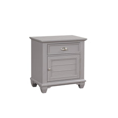 The Jamestown Wood Nightstand in Gray is a stylish and functional addition to your bedroom, offering the perfect blend of modern transitional design and practical storage solutions. This nightstand, expertly crafted from solid Acacia, premium manufactured