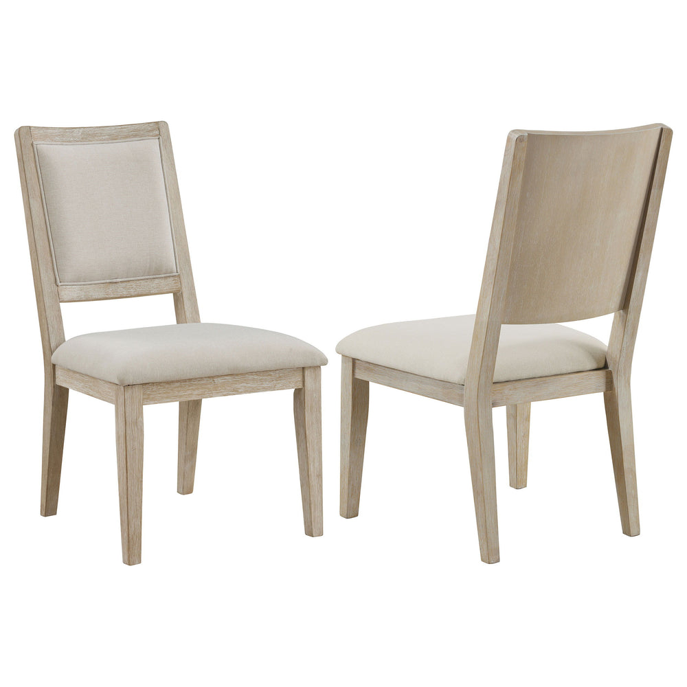 Plus foam and soft upholstery are a perfect complement to the inviting casual charm of a set of two modern farmhouse dining chairs. They feature squared backs with straight, tapered legs for a clean, precise look and feel. They boast wood framing complete