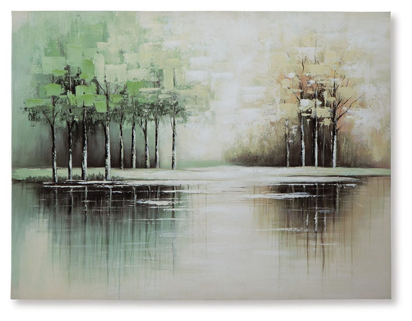 This wall art incorporates a touch of serene style into your decor. Trees are reflected in the rippling water of the foreground, crafting a peaceful landscape youâ€™ll love to get lost in. With its green, tan and white hues, itâ€™s a welcome addition to c
