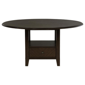  this table makes a striking centerpiece for any dining room. The pedestal base includes two drawers 