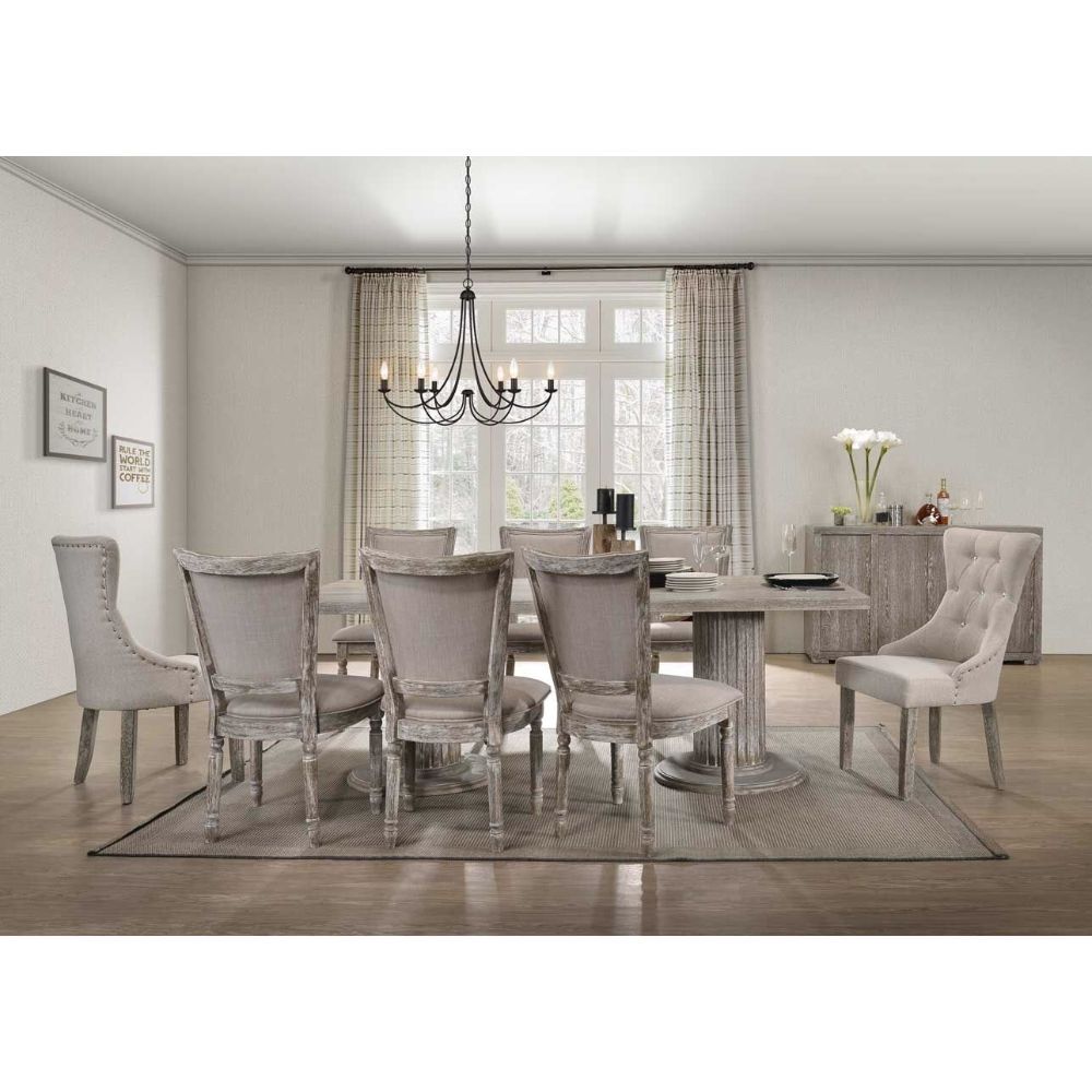 Ideal for a sophisticated dining area, the Gabrian dining collection and its beautifully artistic accents will transform a conventional room into a luxurious dining space. The table features a spectacular double pedestal base with fluted column design typ