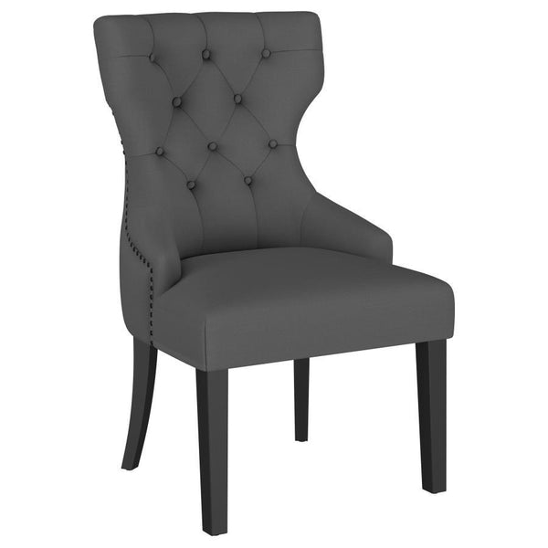 Create an exceptional, inviting dining room space with a modern button tufted dining chair. It pairs a classic wingback profile with a gentle curvature, offering impeccable comfort and chic style. Its plush back and seat feature foam cushioning with soft 