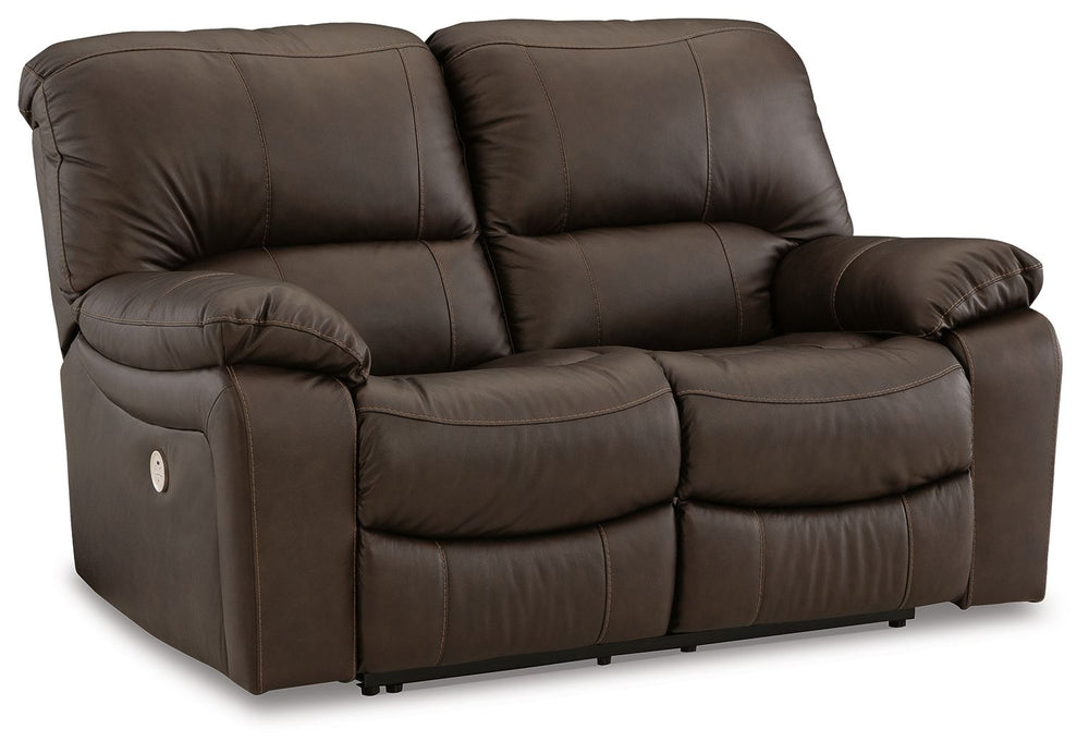 Focus on function. This practical power reclining loveseat balances contemporary character and irresistible comfort. Its affordable, expertly matched leather and faux leather upholstery keeps your style up to speed without breaking the bank. Reclining wit