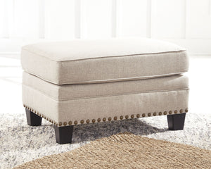  this ottoman in beige brings a fresh perspective to modern farmhouse living. Distinctive elements include nailhead trim and a lovely linen-weave upholstery for an up-t