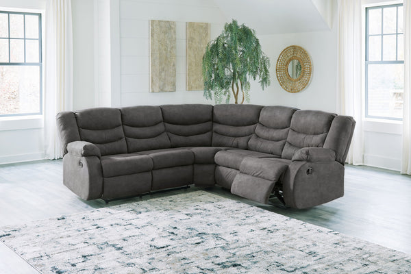  this sectional is a star in social spaces. Its sleek slate gray faux leather is well-suited for mixing and matching with your existing pieces. Pull tab reclining keeps you and your compan