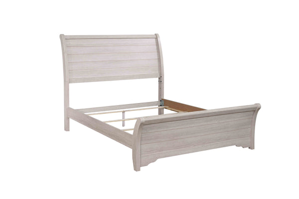  coastal elegance. The centerpiece is a bed with a gently curved headboard