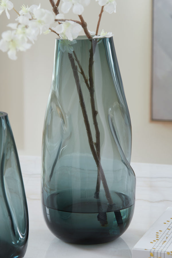  it also acts as a beautiful vessel for florals and other decorative fillers. And the vase is safe for outdoor 