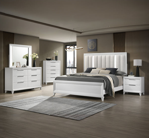 This bedroom set is the epitome of modern elegance, designed for those who desire a sleek and sophisticated sleeping environment. The crisp white finish of the furniture brings a refreshing vibrancy to the room, making it feel both spacious and inviting. 