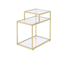Modern simplicity makes your space feel uncluttered and stylish. The Uchenna Side Table has a brilliant color and lustrous finish to enhance it-'s sleek modern silhouette. Metal table frame in a gold finish exudes lustrous shine, topped with tempered glas
