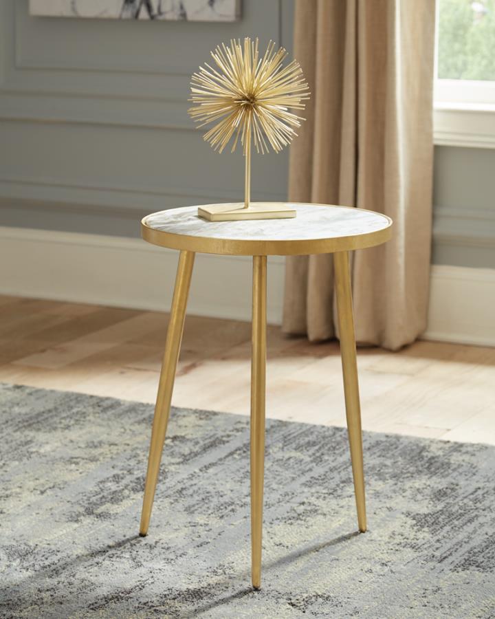 This elegant side table features a genuine white marble top supported by a sturdy metal frame in a sleek gold finish. The round design brings a modern, minimalist look, while the tapered legs ensure stability and durability. Perfect as a functional accent