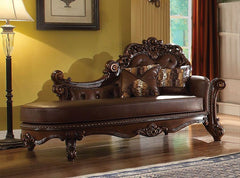 Create an elegant, traditional design in your room with the Vendome Chaise. A hand-crafted piece inspired from the luxurious designs of the past, the beautiful cherry finished bench features a PU cherry button-tufted back with Nailhead trim, two accent pi