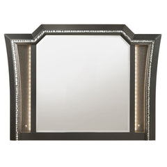 The Kaitlyn mirror provides a commanding presence in any room. Crafted with a transitional look that is an ideal addition to any bedroom, the mirror is accented with LED light and a crystal-like sparkling trim. Its crystal-like trimming creates dazzling g