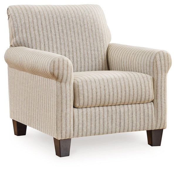 Seeking simple, transitional style? Enter this accent chair. Its commitment to carefree comfort is right at home with your relaxed living room aesthetic. A classic striped pattern elevates the everyday charm of the neutral fabric, while the deep, plush se