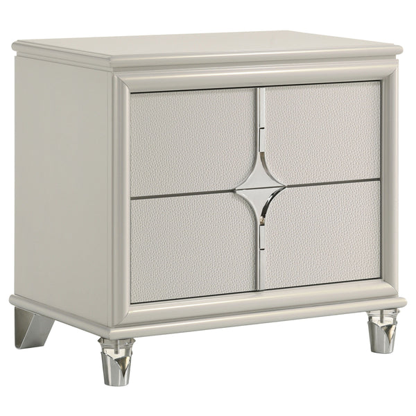 Elevate your nighttime routine with this stylish 2-drawer nightstand, a perfect blend of form and function. The pearl white finish and diamond star design on the drawer front offer a touch of glamour, while the chrome metal pulls add a sleek contrast. Fea
