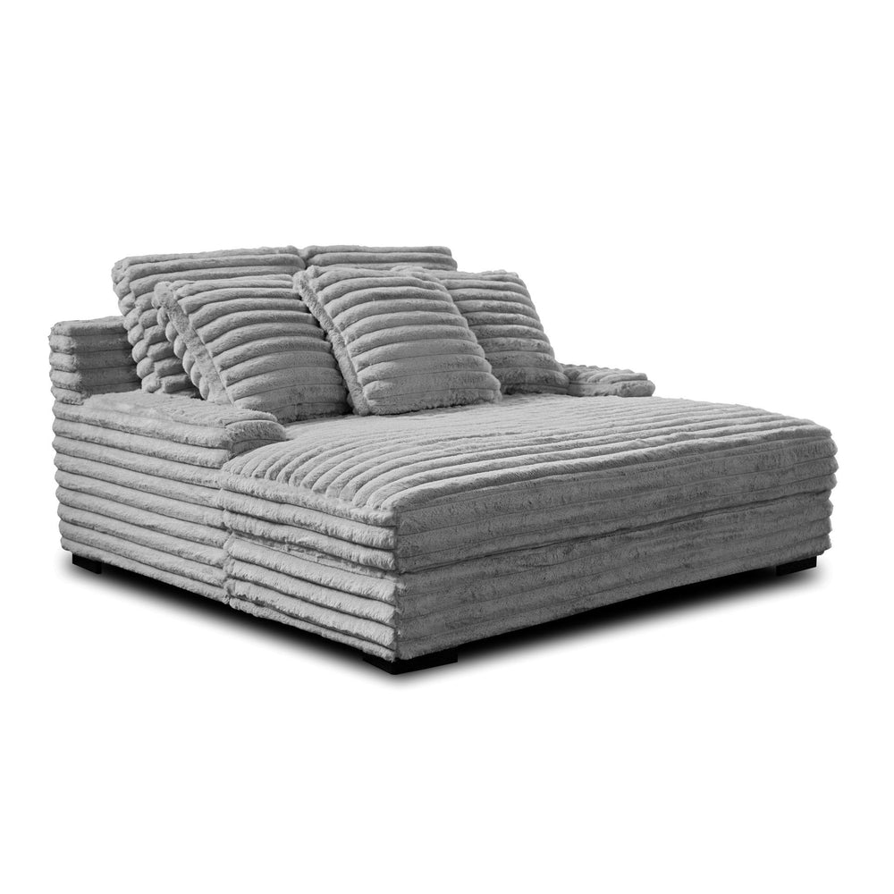 The Embrace Dual Chaise Lounge in gray is a luxurious and versatile addition to your home, perfect for both lounging and accommodating guests. Featuring 100% gray polyester fabric with a fluffy, blanket-like texture, this chaise lounge is designed for ult