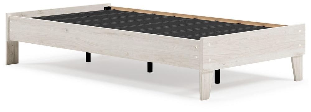 Bringing big style to small living areas, this twin platform bed is a smart, space-saving choice for those with an eye for contemporary design. Its clean-lined profile with understated refinements creates such a simple silhouette that works in so many set