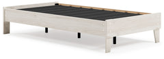 Bringing big style to small living areas, this twin platform bed is a smart, space-saving choice for those with an eye for contemporary design. Its clean-lined profile with understated refinements creates such a simple silhouette that works in so many set