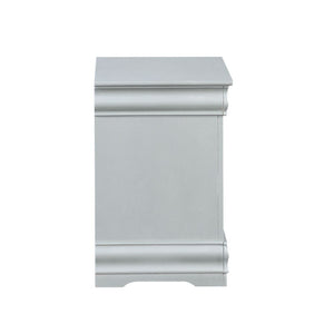  the simple moldings and luxurious pull handles add subtle