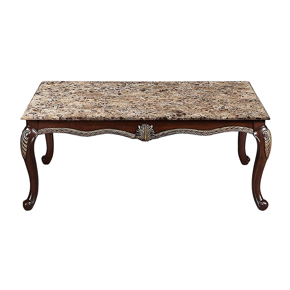 The Royal Classics Maximus Coffee Table / Cocktail Table in cherry is a perfect blend of heirloom craftsmanship and timeless design. Expertly crafted from solid pine with premium polyurethane carving details, this table offers both durability and long-las
