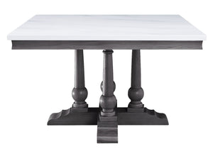  the dining table has a pedestal base which gives its tabletop both sturdy and elegant support. The square tabletop in white artificial marble highlights its clean lines and complements the gray oak finish 