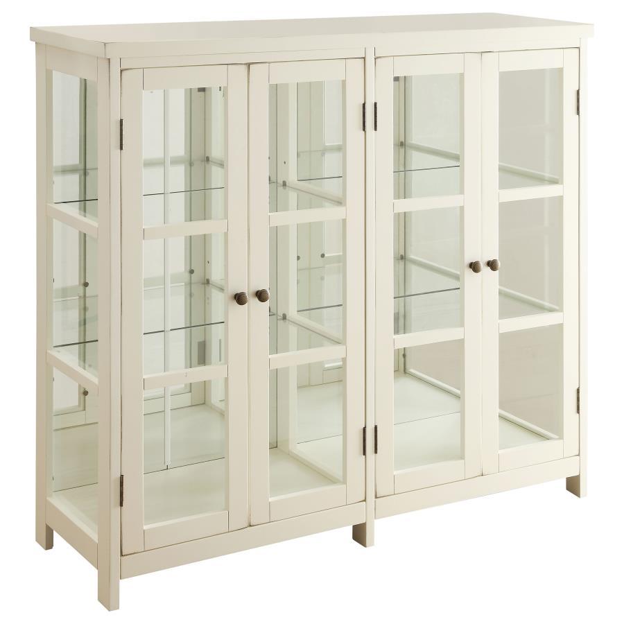 Brighten up any space with this elegant white accent cabinet, perfect for showcasing collectibles and dÃ©cor. Featuring four framed glass doors, glass side panels, and interior glass shelving, it offers a light and airy look that highlights whatever you s