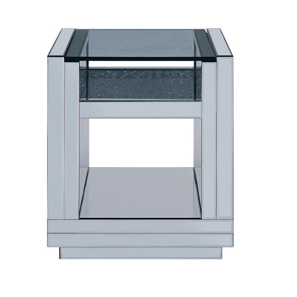 The Nysa End Table will add a contemporary touch to any room in your home. With its clean lines, this brilliant square occasional table showcases a distinctive style for an intriguing look. The table features a fully mirrored sled base with an exquisite b