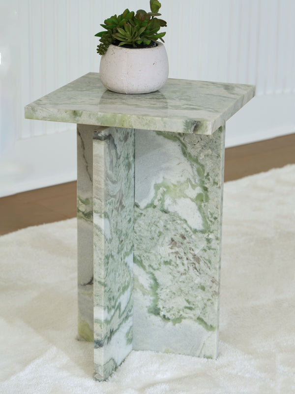  this marble accent table is a standout piece that effortlessly blends with contemporary decor. Perfect for placing next to your couch or bed