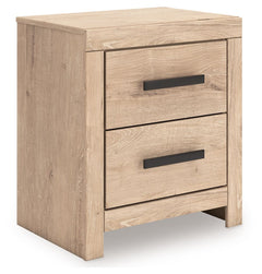 This nightstand brings a touch of modern farmhouse charm to your home. Its light oak finish and clean lines have a fresh, airy feel, effortlessly creating an inviting atmosphere for a restful nightâ€™s sleep. Spacious drawers with large black handles prov