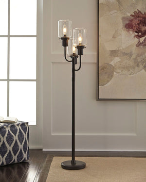  much like a decorative lamp post. A bronze-tone metal finish adds sleek de