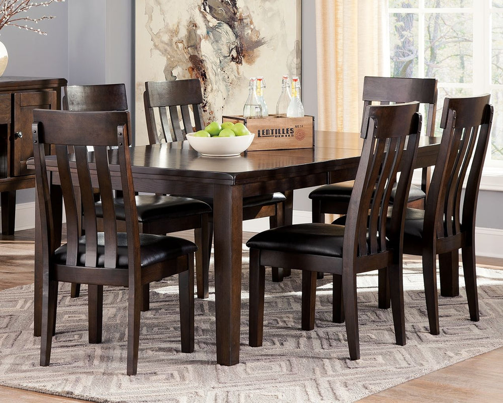 Take clean-lined, classic styling and touches of vintage inspiration. Top with a deep, complex finish for newfound sophistication. Now that-'s a look you can live with. Sporting a straightforward farmhouse profile, this dining room table easily accommodat