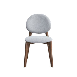  this set exudes contemporary charm. The curved design of the table legs and the soft upholstery of the chairs offer both style and comfort. Perfect for