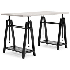 Love an urban farmhouse aesthetic? Make it work to your advantage with this beautifully styled home office desk. A simply striking choice in home office furniture, it has an unmistakable farmhouse feel thanks to design elements including a whitewashed fin
