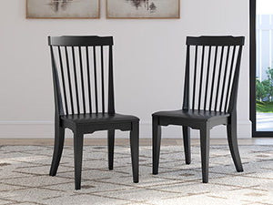 This dining chair is made for the moments when family and friends gather. Its charming spindle-back design inspires easygoing mornings over coffee and dishing about your day during dinner. Outfitted with a chic neutral hue and a contoured seat for comfort