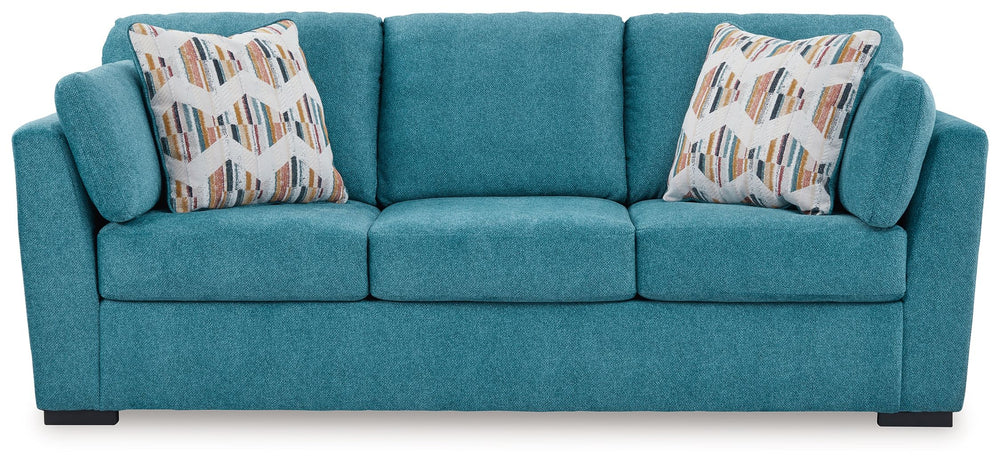 You want your home to reflect your modern, trendy eye for design. This sofa is here to help. Bold, bright and beautiful, it adds a fashion-forward pop of color to your living room. Velvet-like upholstery and matching bolster pillows keep comfort at top of