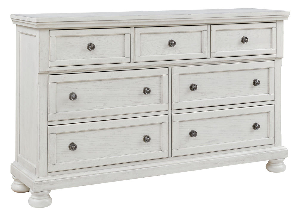 Elegant, timeless furnishings take your bedroom to the next level. Nothing does that better than this dresser. The antiqued white finish with a wonderful grain texture radiates sophistication, while the dark bronze-tone hardware adds an ornate touch. A hi