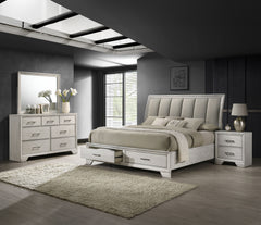 This bedroom set offers a sleek and stylish update to any space, featuring a white mist finish that commands attention while maintaining a sense of warmth and coziness. The bed stands as the stunning centerpiece, with its high, padded headboard upholstere