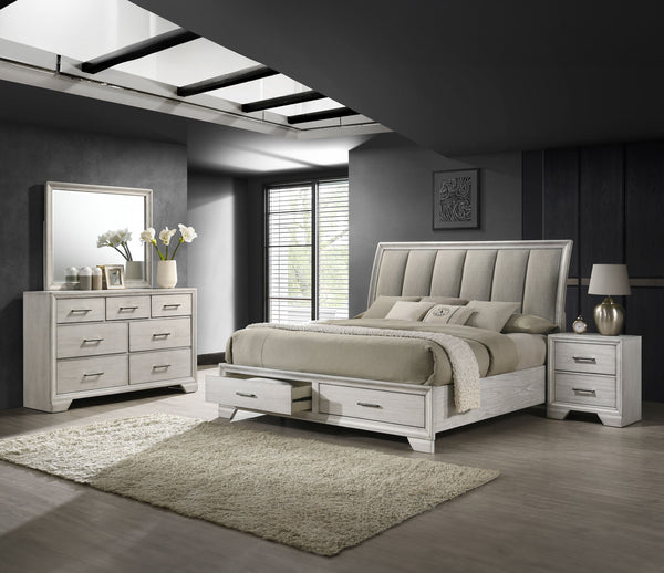 This bedroom set offers a sleek and stylish update to any space, featuring a white mist finish that commands attention while maintaining a sense of warmth and coziness. The bed stands as the stunning centerpiece, with its high, padded headboard upholstere