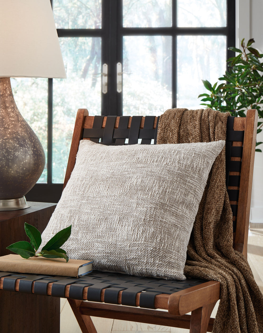 With the inviting design of this throw pillow, you can take your space from drab to fab. Its wonderfully woven texture creates a piece with a classically chic flair, adding depth and dimension to your seating area.<br/><br/><b>Product Features</b><ul><li>