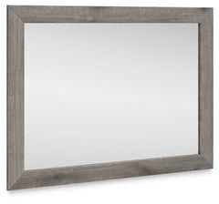 Combining a casual aesthetic with functional flair, this bedroom mirror suits styles from rustic to industrial. In a chic weathered gray hue, it brings a charmingly curated vibe to your morning and nighttime routines. Stage it as you pleaseâ€”this mirror 