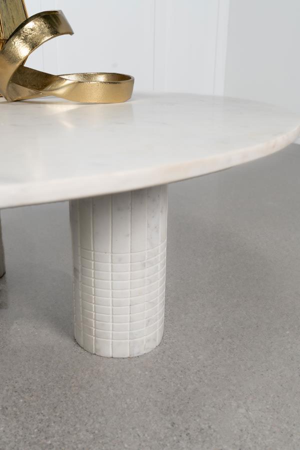  commands attention with its avant-garde design. Its round top rests on three cylindrical pedestals