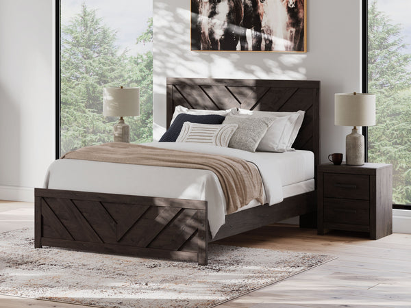  this queen panel bed is a simply chic approach to modern living. A dark charcoal finish blends black and brown undertones