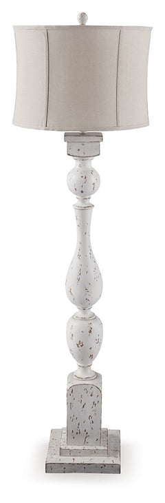 This floor lamp takes a classic approach to tasteful lighting. Its detailed base ushers an air of elegance into your space with a graceful turn design. Outfitted with an antiqued white finish, it-'s right at home in traditional spaces. Pair with the match