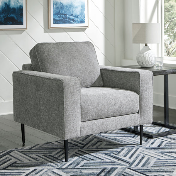  the slim-profiled piece welcomes you with its cozy character. A subtle chevron pattern on the cushions refresh the classic neutral hue