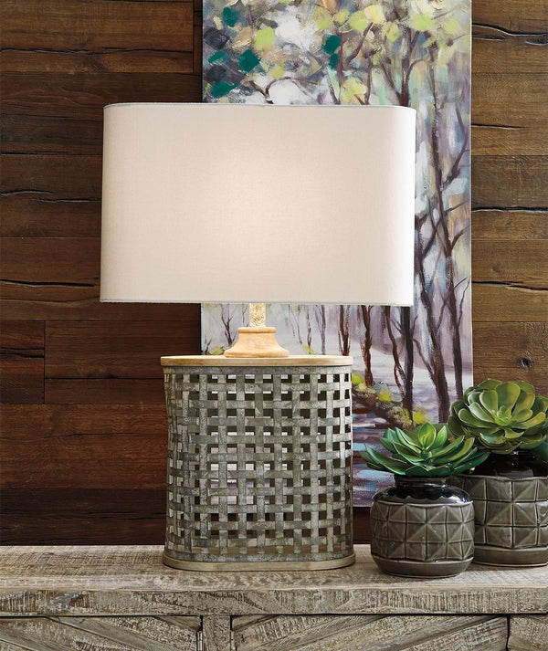  this neutral table lamp simply delights. Its whitewashed finish over galvanized metal adds the perfect rustic refined tone. The shapely base